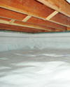 a moisture barrier installed on the walls and floors of a crawl space in Hastings
