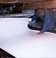 Oswego insulation being installed in a crawl space.