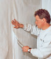 Oswego, New York installation in progress of a crawl space vapor barrier
