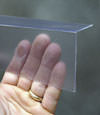 Closeup of a clear plastic covering on a Marcy crawl space block wall