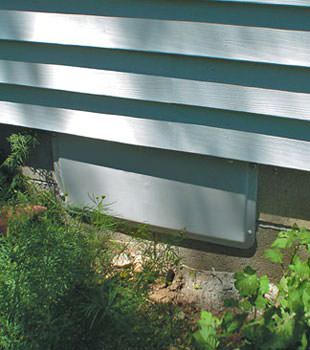 A gray crawl space vent cover in Skaneanteles