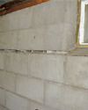 Severely buckling foundation walls in a home in Oneida in need of repairs.