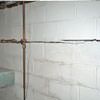 Severe foundation damage from a long crack in a bucking wall of a Knoxboro home.