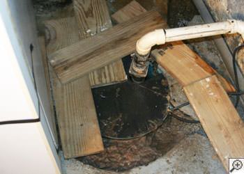 An ugly, clogged sump pump system in Oswego, New York