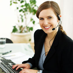 A disaster restoration customer service expert in Auburn manning the phones