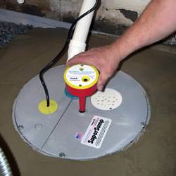 A newly installed sump pump system in a basement in Clinton