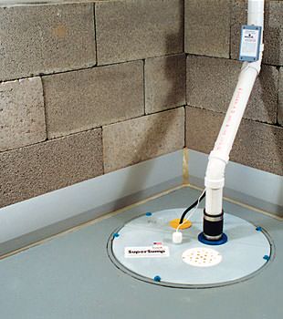 A baseboard basement drain pipe system installed in Marcy