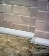 Our baseboard drain system installed on a corner in a Oneonta basement.