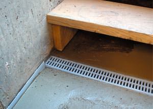 a hatchway entrance in Canastota that has been protected from flooding by our TrenchDrain basement drainage system.