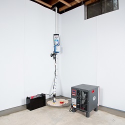 Sump pump system, dehumidifier, and basement wall panels installed during a sump pump installation in Knoxboro