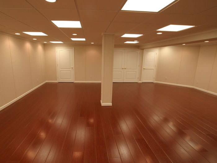 Wood Laminate Basement Floor Finishing In Syracuse Utica Rome Rosewood Faux Wood Basement Flooring For Finished Basements In Syracuse