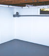 Rome, NY wet basement wall covering that tucks into a perimeter drainage system